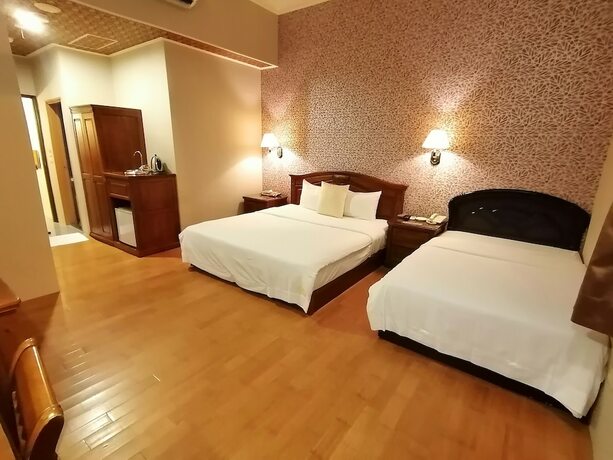 Imagen de la habitación del Motel Dibao. Foto 23