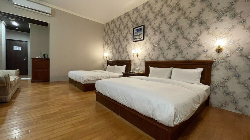 Imagen de la habitación del Motel Dibao. Foto 26