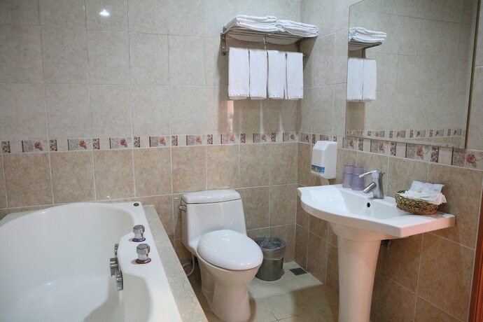 Imagen de la habitación del Motel Dibao. Foto 27