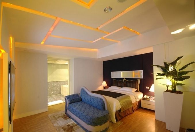 Imagen de la habitación del Motel Discovery - Tucheng. Foto 16