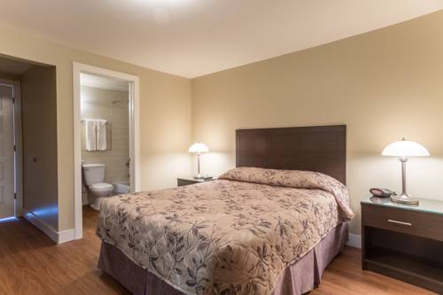 Imagen de la habitación del Motel Du Fleuve. Foto 4