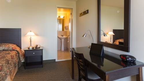 Imagen de la habitación del Motel Du Fleuve. Foto 13