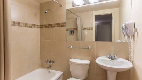 Imagen de la habitación del Motel Du Fleuve. Foto 15
