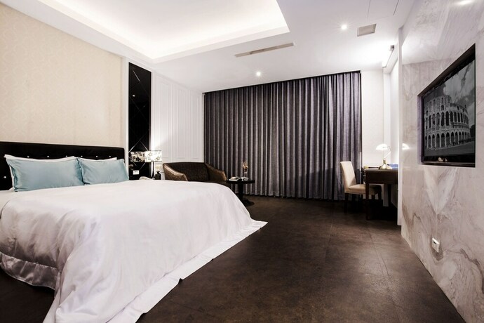Imagen de la habitación del Motel Duo Romance Hualien. Foto 28