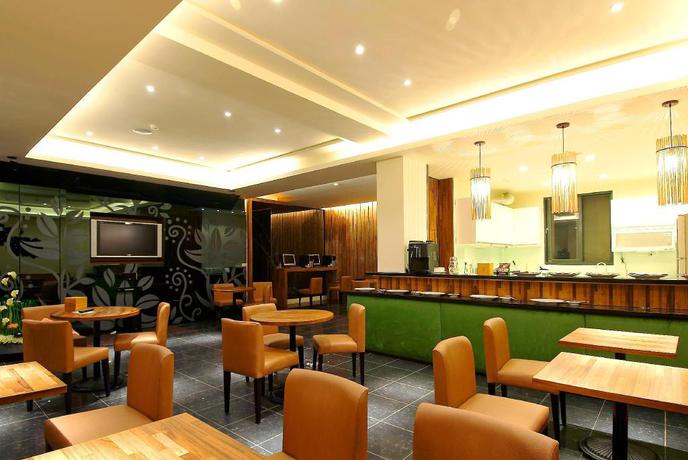 Imagen del bar/restaurante del Motel Ease, Caotun. Foto 2