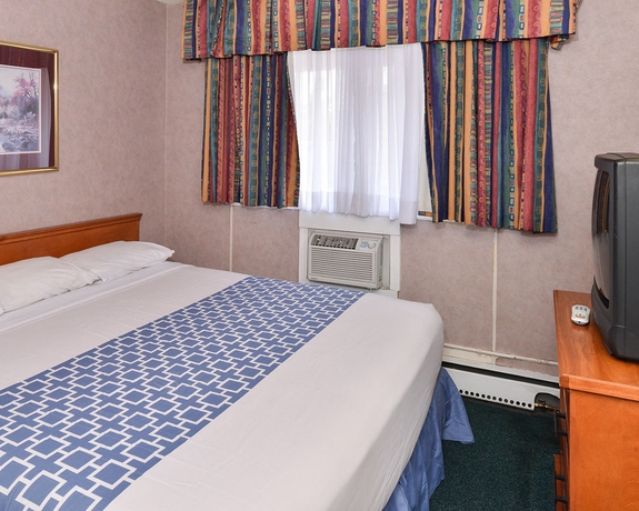 Imagen de la habitación del Motel Econo Lodge Village. Foto 2