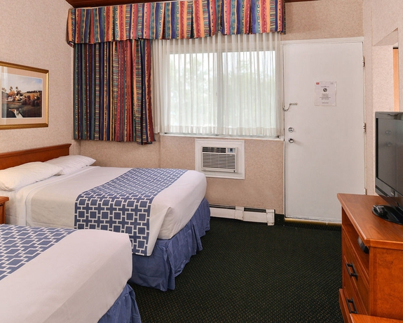 Imagen de la habitación del Motel Econo Lodge Village. Foto 4