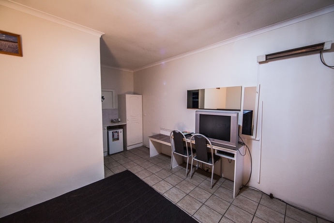 Imagen de la habitación del Motel Elkira Court. Foto 10