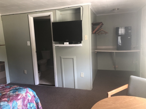 Imagen de la habitación del Motel Elmwood Motor Lodge. Foto 3