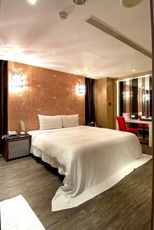 Imagen de la habitación del Motel Feng Cai. Foto 16