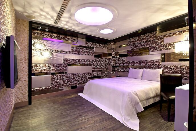 Imagen de la habitación del Motel Feng Cai. Foto 17