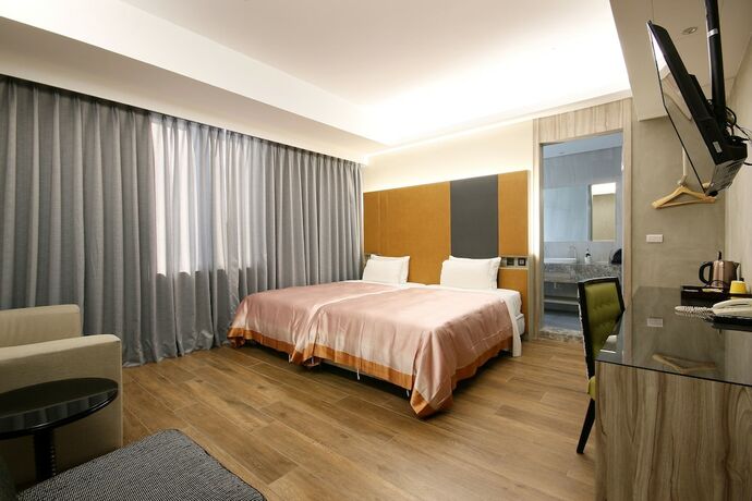 Imagen de la habitación del Motel Feng Cai. Foto 18
