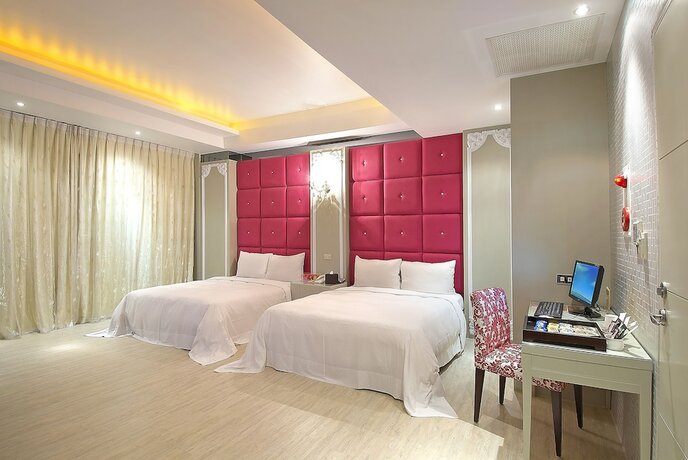 Imagen de la habitación del Motel Feng Cai. Foto 20