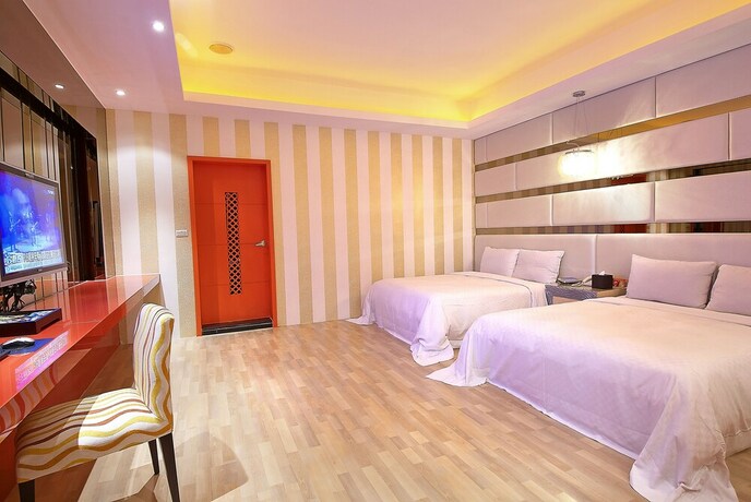 Imagen de la habitación del Motel Feng Cai. Foto 23