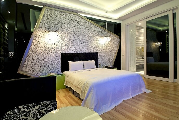 Imagen de la habitación del Motel Feng Cai. Foto 25