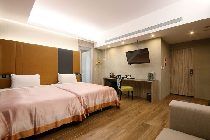 Imagen de la habitación del Motel Feng Cai. Foto 26