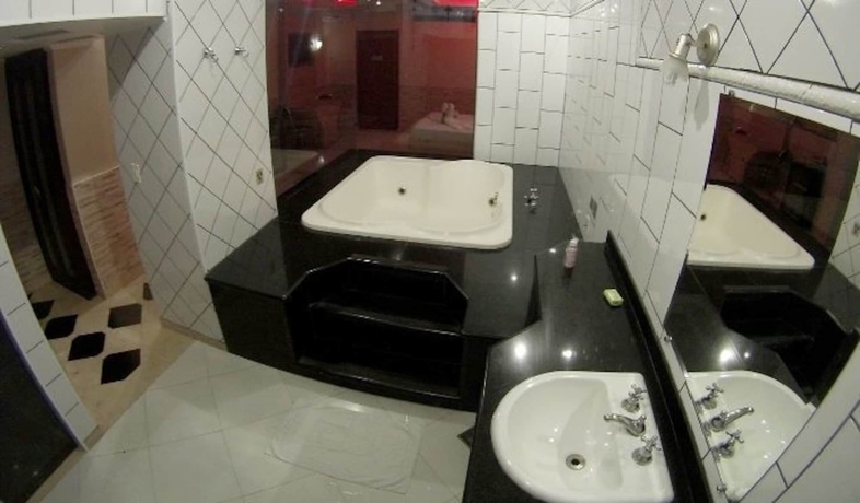 Imagen de la habitación del Motel Flamboyant - Adults Only. Foto 7