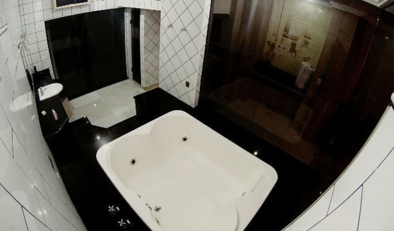 Imagen de la habitación del Motel Flamboyant - Adults Only. Foto 17