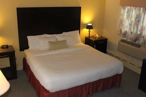 Imagen de la habitación del Motel Four Winds Country. Foto 9