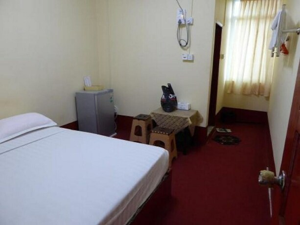 Imagen de la habitación del Motel Galaxy Hpa An. Foto 20