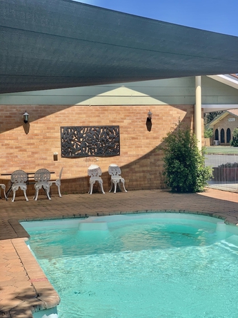 Imagen de la piscina del Motel Gilgandra. Foto 19