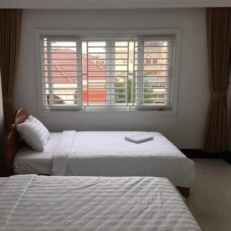 Imagen de la habitación del Motel Golden House, Phnom Penh. Foto 23