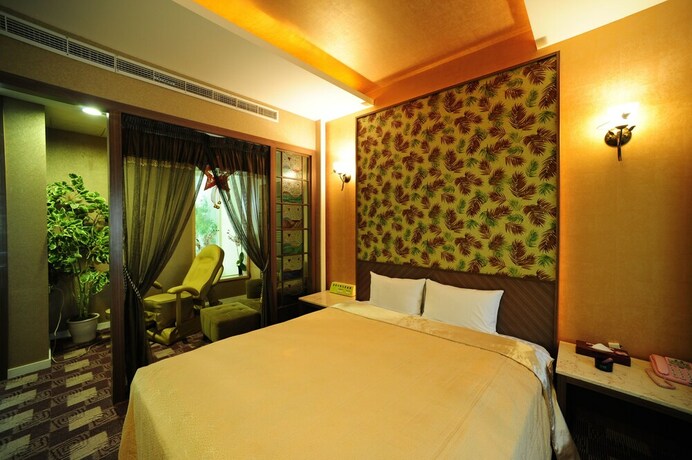 Imagen de la habitación del Motel Golden, Hsinchu City. Foto 5