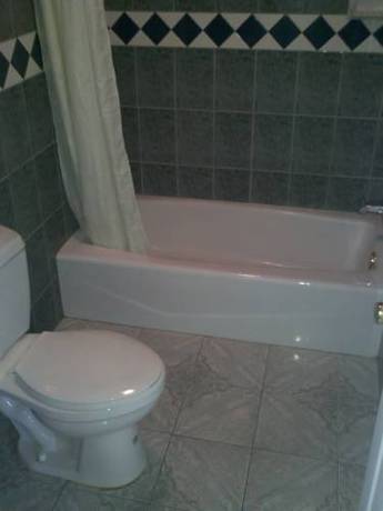 Imagen de la habitación del Motel Golden West Manor. Foto 4
