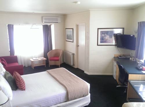 Imagen de la habitación del Motel Grand Country Lodge. Foto 1