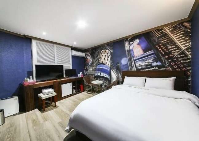 Imagen de la habitación del Motel Happy Q. Foto 37