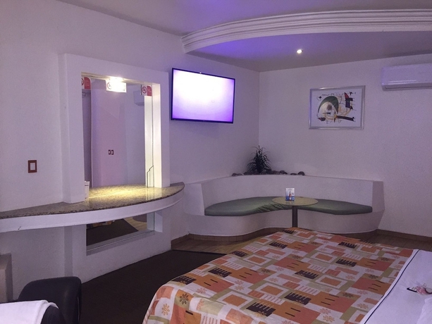 Imagen de la habitación del Motel Helsinky - Adults Only. Foto 12