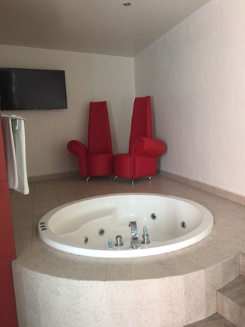 Imagen de la habitación del Motel Helsinky - Adults Only. Foto 16