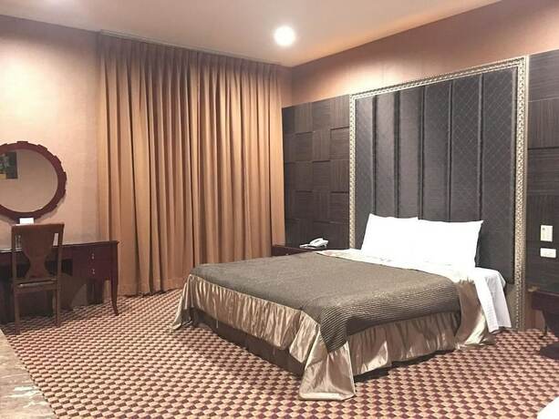 Imagen de la habitación del Motel Her Home Spa Douliu. Foto 15