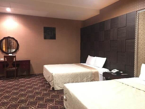 Imagen de la habitación del Motel Her Home Spa Douliu. Foto 23