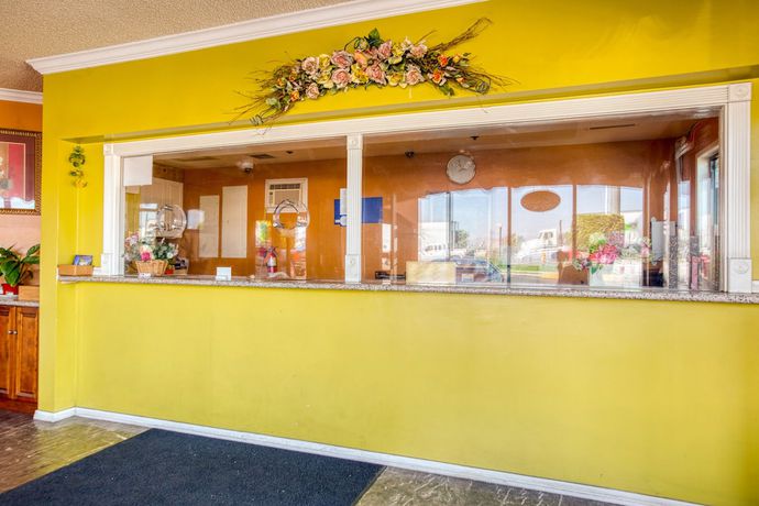 Imagen de los interiores del Motel Heritage Inn and Suites, Corona. Foto 17