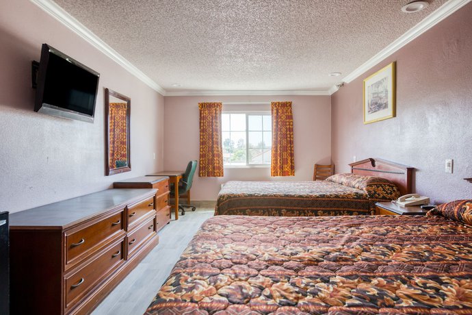 Imagen de la habitación del Motel Heritage Inn and Suites, Corona. Foto 8