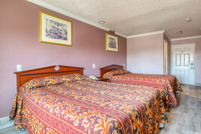 Imagen de la habitación del Motel Heritage Inn and Suites, Corona. Foto 10