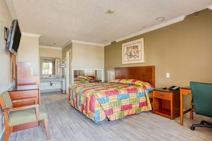 Imagen de la habitación del Motel Heritage Inn and Suites, Corona. Foto 14