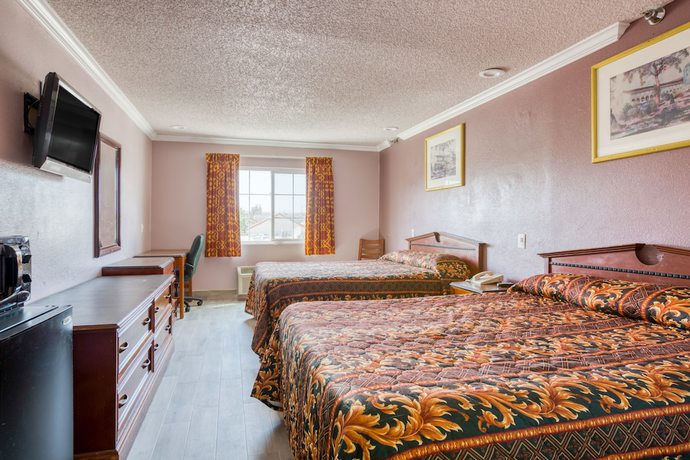 Imagen de la habitación del Motel Heritage Inn and Suites, Corona. Foto 16