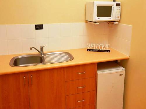 Imagen de la habitación del Motel Higgins Lane. Foto 5