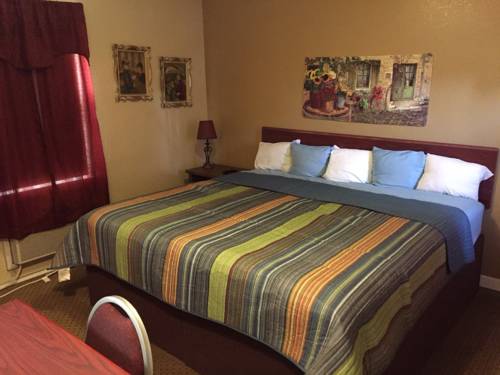 Imagen de la habitación del Motel Highland Court. Foto 2