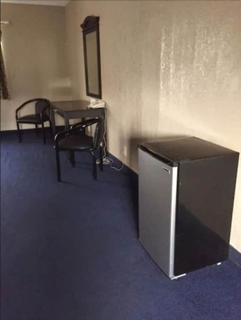 Imagen de la habitación del Motel Highland Park. Foto 17
