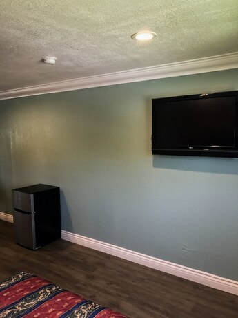 Imagen de la habitación del Motel Highland Park. Foto 19