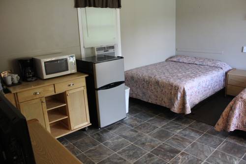 Imagen de la habitación del Motel Hill View And Cottages. Foto 5