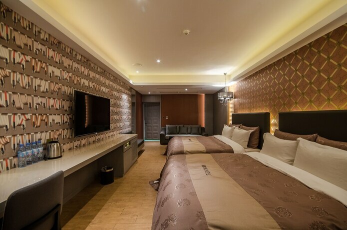Imagen de la habitación del Motel Hola, Taichung. Foto 17