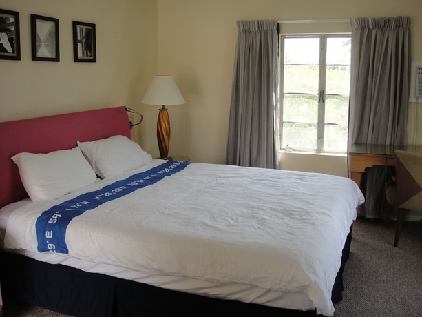 Imagen de la habitación del Motel Holiday House. Foto 8