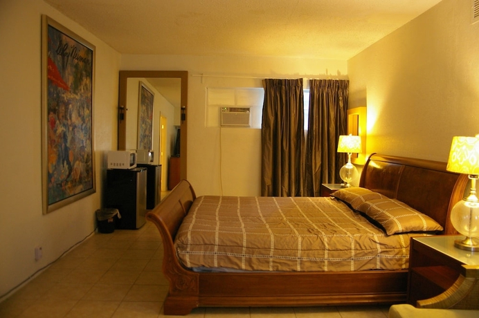 Imagen de la habitación del Motel Holiday House. Foto 14