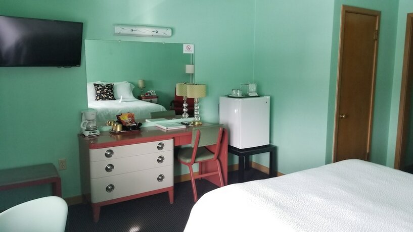 Imagen de la habitación del Motel Holiday Music. Foto 11