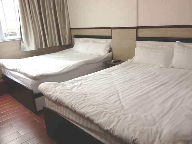 Imagen de la habitación del Motel Hong Kong, Hong Kong. Foto 3