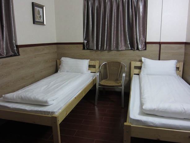 Imagen de la habitación del Motel Hong Kong, Hong Kong. Foto 6
